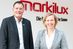 Christiane Berning und Klaus Wuchner vor dem neuen zeitlos-schlichten Logo: Mit dem neuen Corporate Design soll noch klarer kommuniziert werden, dass Markilux ein erfolgreiches, modernes Unternehmen ist.